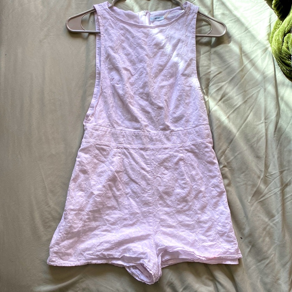 Super trendy romper with open sides